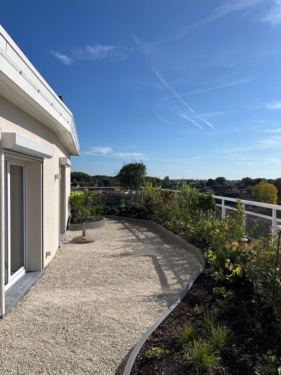 Daktuin met vijver in Borsbeek, foto 11